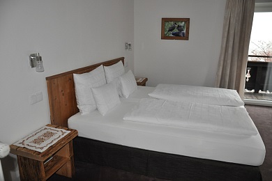 Wonderful bedroom 1 with couch, balcony and views to the town in holiday apartment 5, Elisabeth apartments